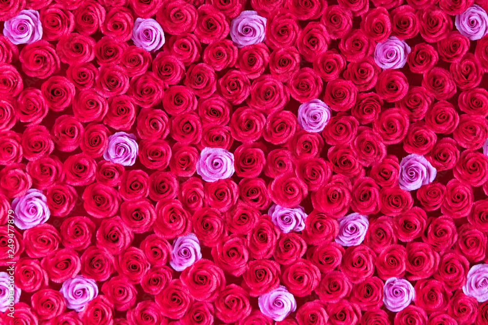 Small roses handmade paper, texcre. Red background. Small roses handmade paper, texcre. Red background.