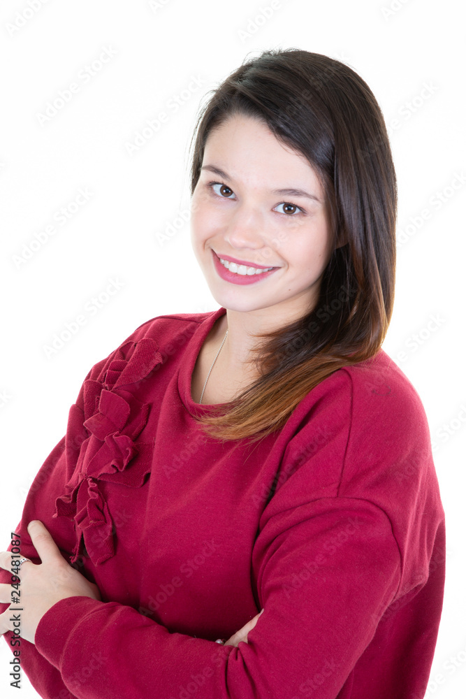 Pretty teenager girl posing smiling with folded arms Pretty teenager girl posing smiling with folded arms