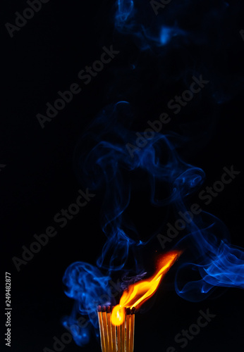 Match, smoke and flame