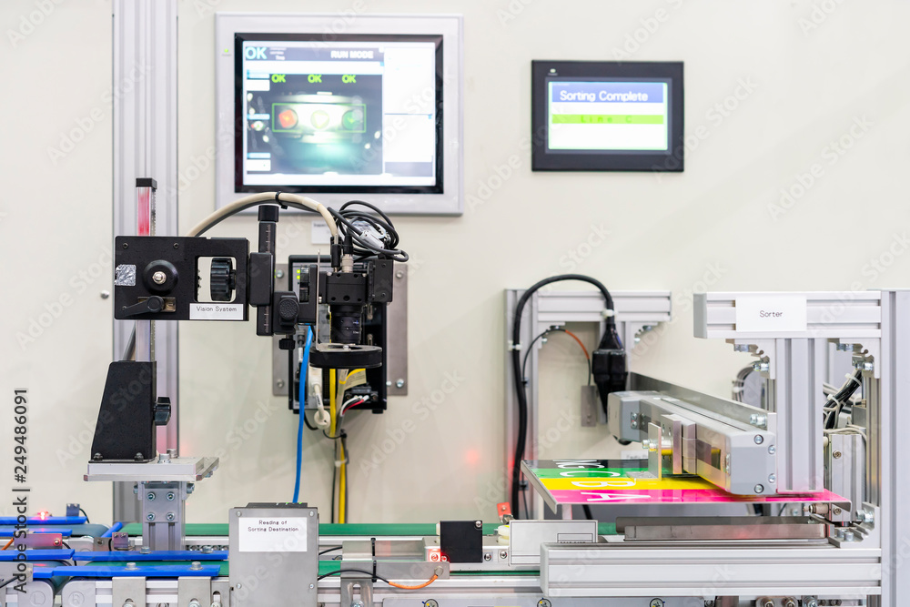 high technology vision measuring or inspection machine connect or communication with sorter device unit equipment for quality control product in manufacturing at production line high technology vision measuring or inspection machine connect or communication with sorter device unit equipment for quality control product in manufacturing at production line