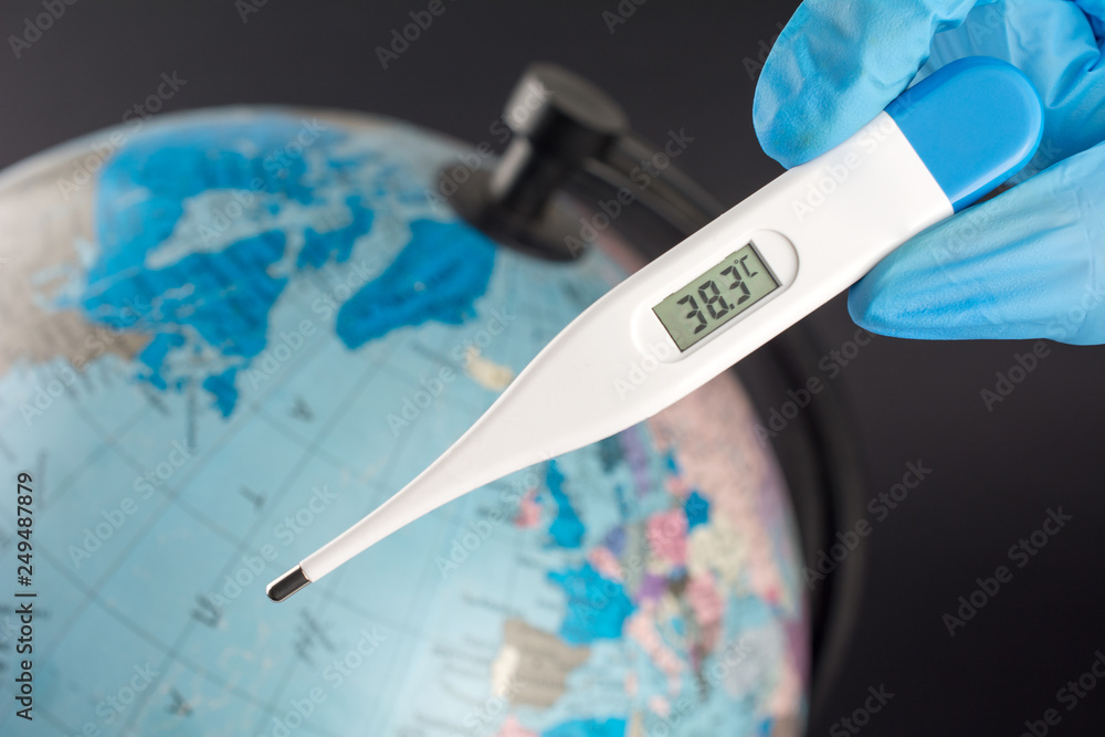 Medical thermometer display 38.3 degrees celsius inscription. earth globe blurred in red black background. Illustration of global warming and climate change Medical thermometer display 38.3 degrees celsius inscription. earth globe blurred in red black background. Illustration of global warming and climate change