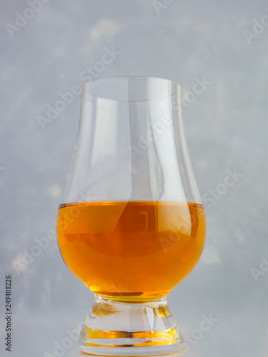 Irish Whiskey Glass Textured Paper Background Portrait Extreme Close Up