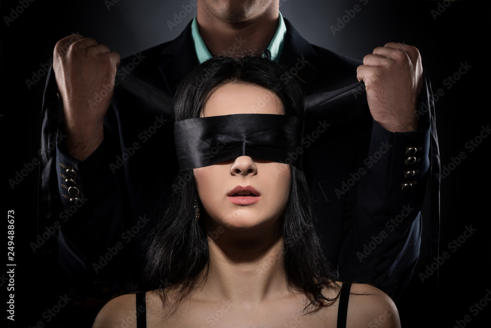 Couple Love Kiss, Sexy Blindfolded Woman and elegant Man in Suit Stock Photo Adobe Stock photo photo