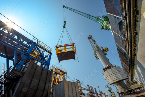 loading lifting of the gantry crane to delivery the goods or shipment or equipment and materials from source to destination photo