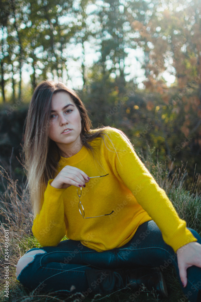 portrait of young woman in autumn park portrait of young woman in autumn park