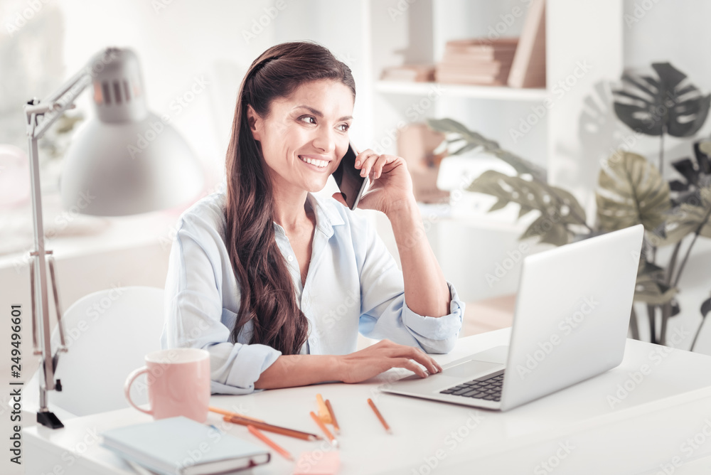 Influential young businesswoman managing her schedule working from home Influential young businesswoman managing her schedule working from home