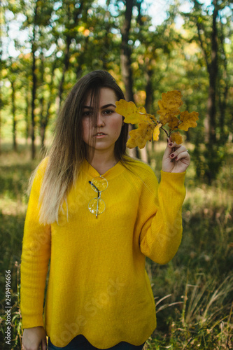 young woman in autumn park