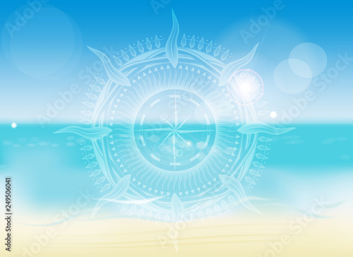 transparent symbol of a nautical compass in the patterns of the background of the summer sea beach