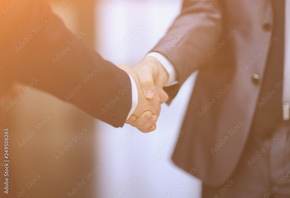 reliable handshake business people. concept of partnership