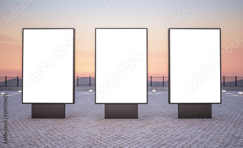 three vertical outdoor billboards photo