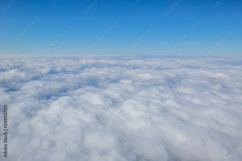White clouds looking from the plane White clouds looking from the plane