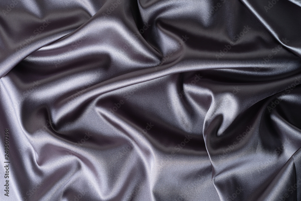 Obraz premium close-up view of piece of satin fabric. Minimal color still life photography