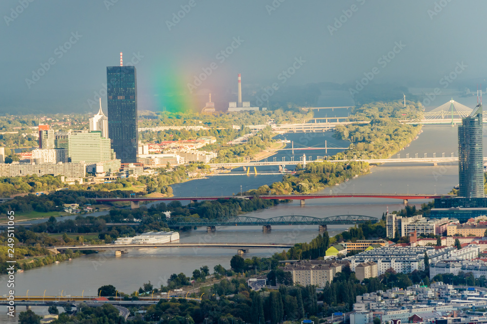 The rainbow and the bridges over the river Danube in Vienna Austria