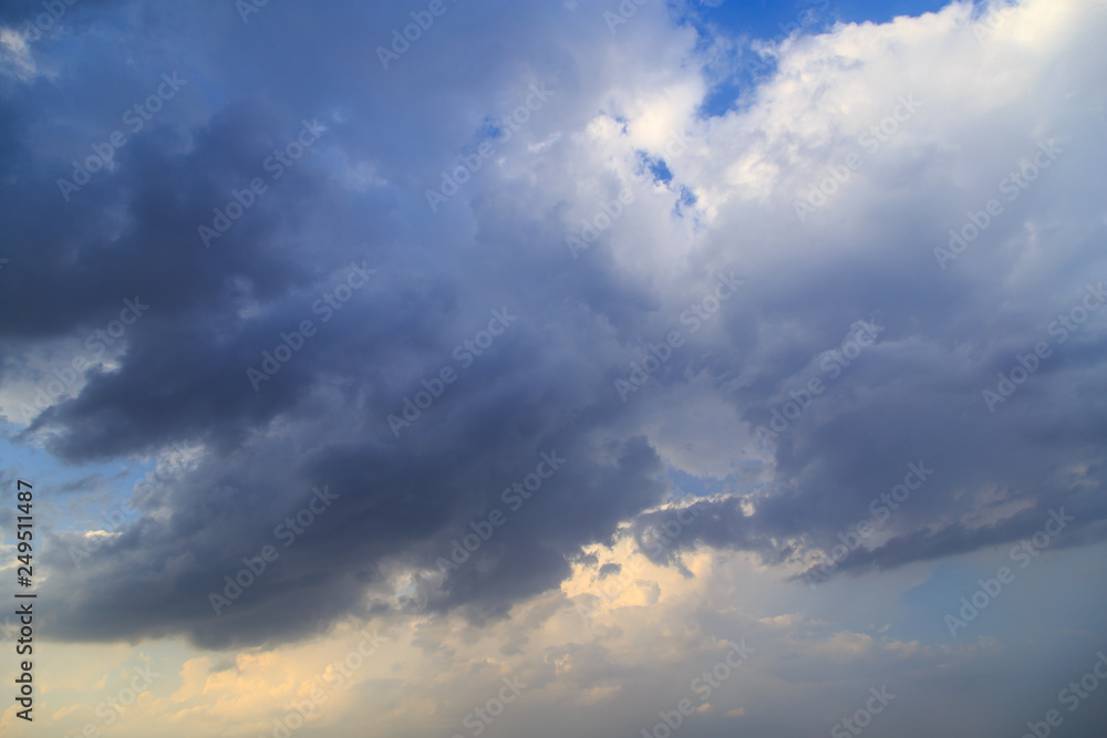 Clouds after rain before sunset as a background