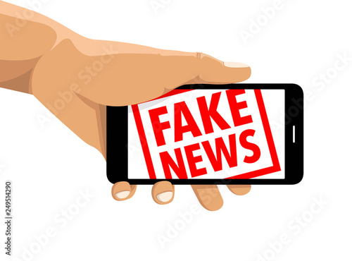 Fake news rubber stamp cell phone