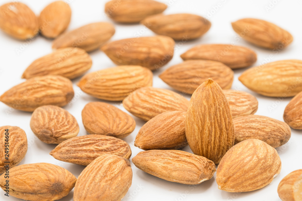 Almonds nut isolated on white background. Full depth of field and clipping path. - Image Almonds nut isolated on white background. Full depth of field and clipping path. - Image
