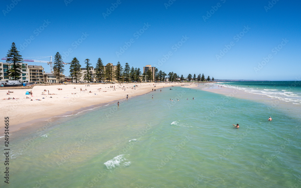 Distant view of Glenelg beach in Adelaide suburb on hot sunny summer day in SA Australia