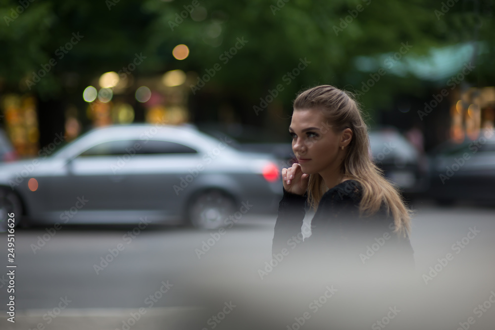 Fototapeta premium young woman in the city