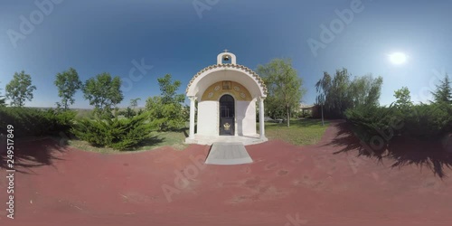 360 VR Video. Green garden with small chapel on the territory of summer resort. Nea Kallikratia, Greece photo