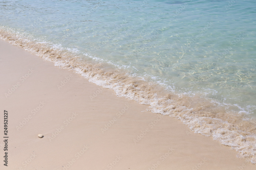 Beautiful sandy beach and soft blue ocean wave Beautiful sandy beach and soft blue ocean wave