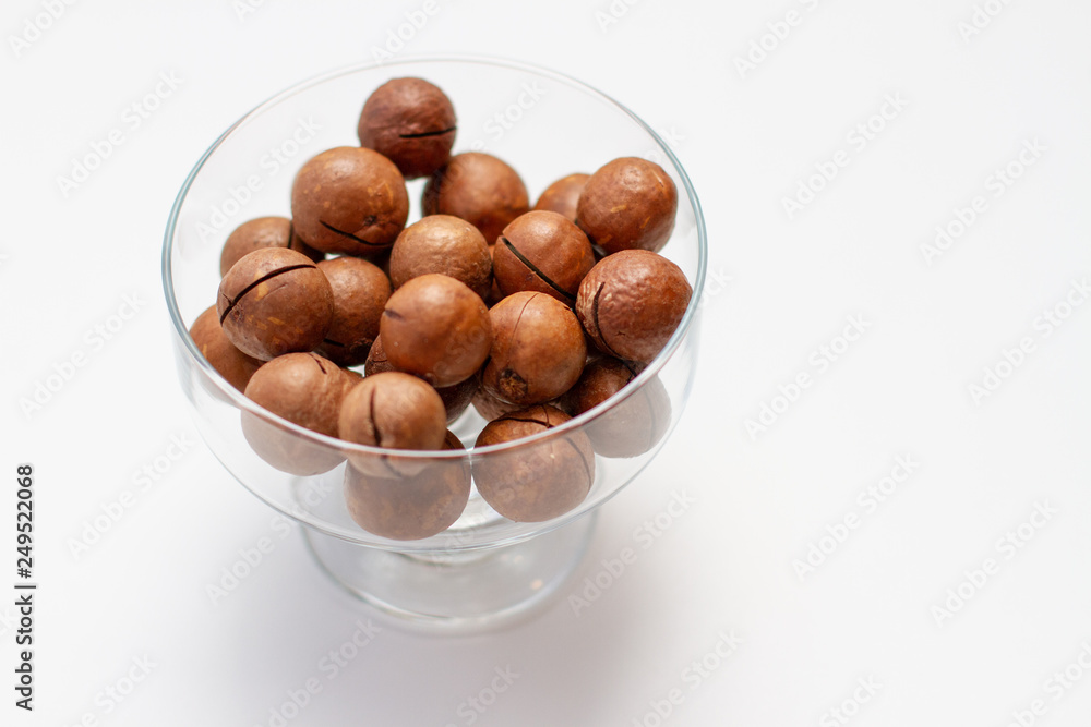 Macadamia nuts on white background Macadamia nuts on white background