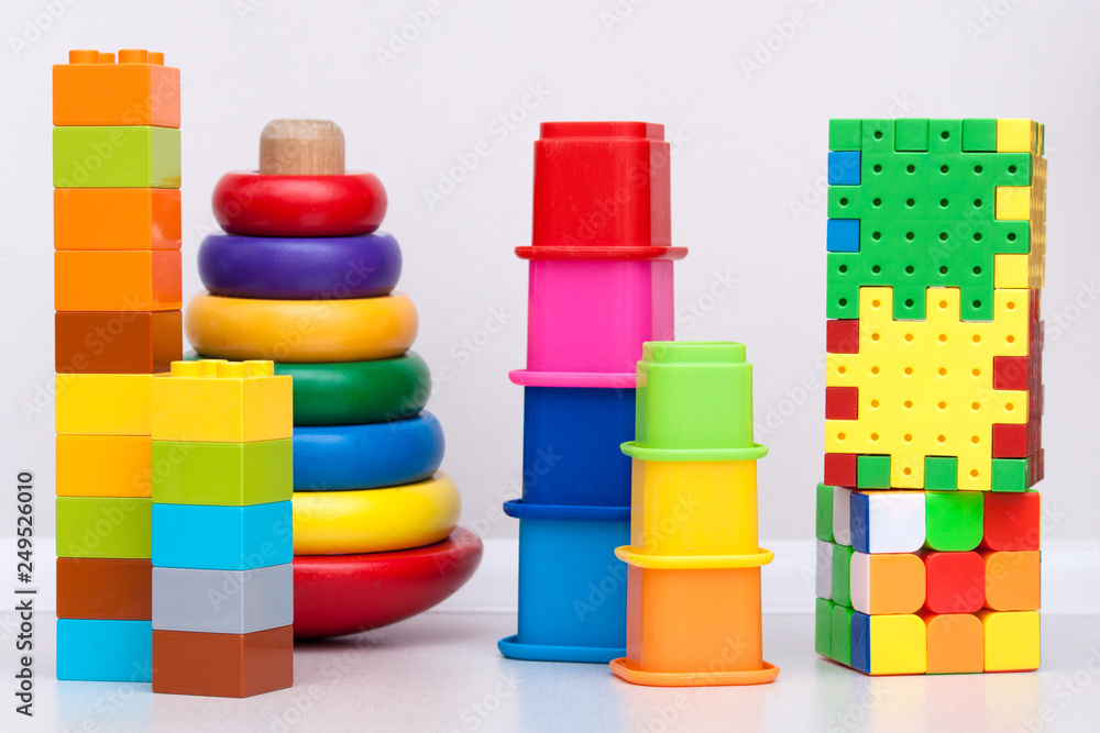 Kids education plastic toys, pyramid on the white background. Kids education plastic toys, pyramid on the white background.
