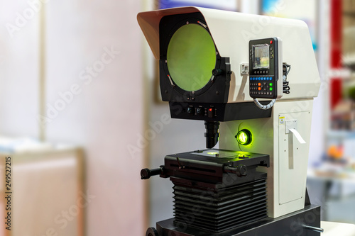 High technology and modern of profile projector or optical comparator for silhouette precision measuring and quality control of small parts in industrial photo