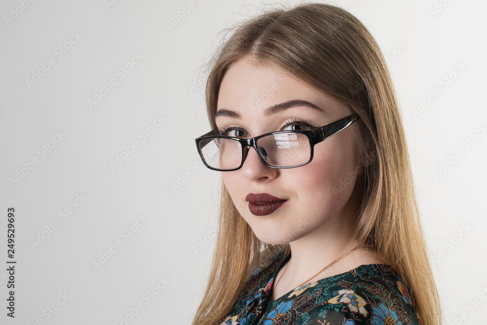 portrait of a young girl with glasses