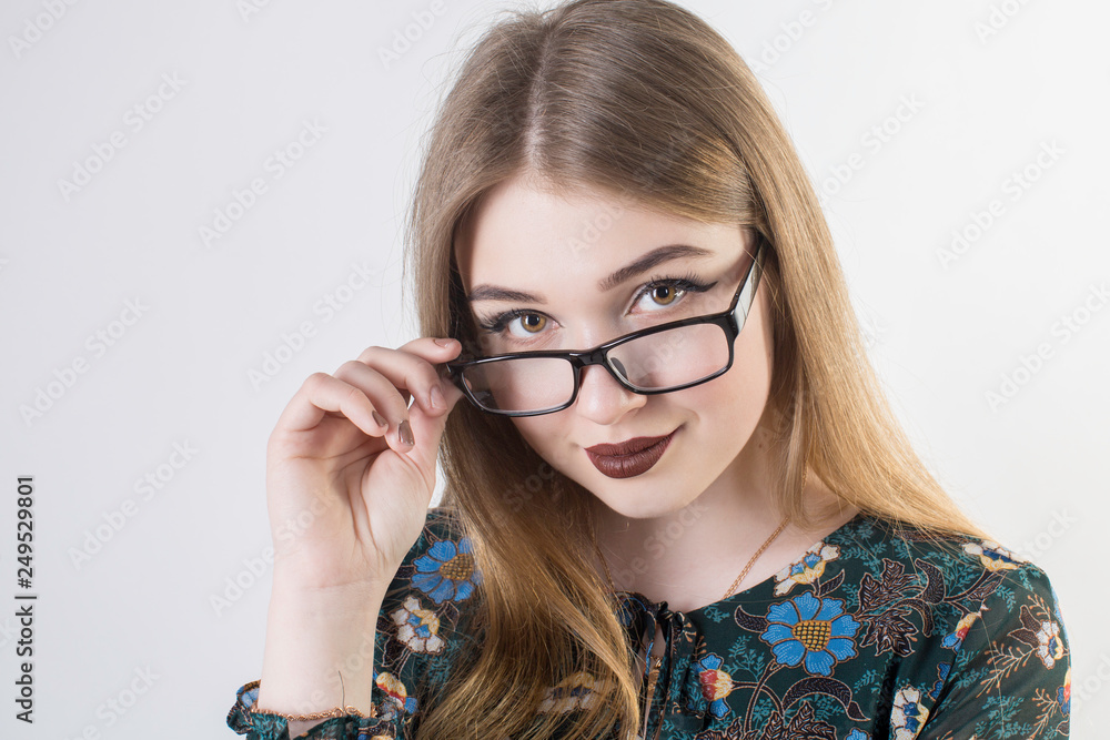 portrait of a young girl with glasses