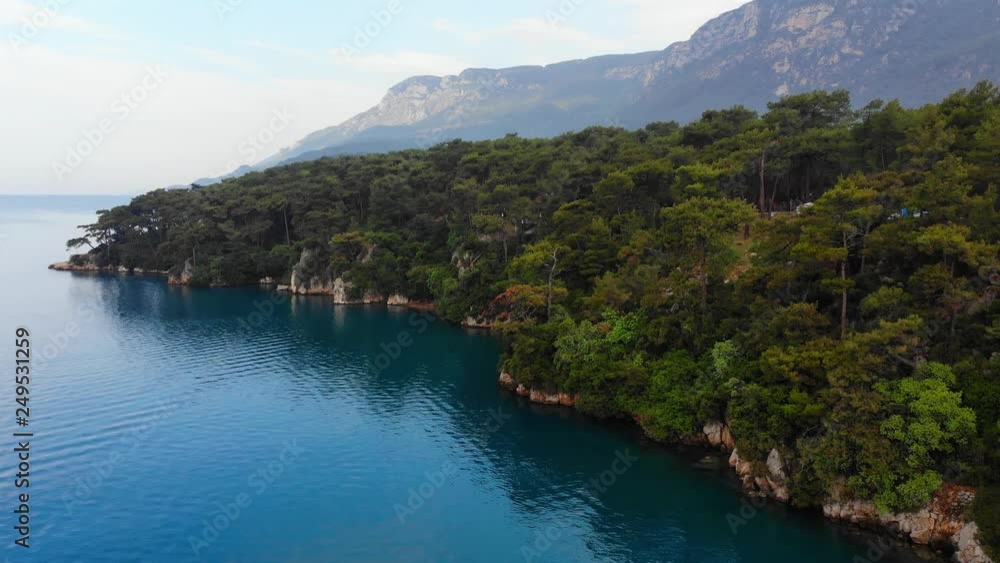 An idyllic aerial view of Gulf of Gokova coastline (the Aegean Sea) under the summer skies… An idyllic aerial view of Gulf of Gokova coastline (the Aegean Sea) under the summer skies…