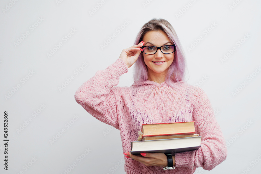 Student. Young woman with books. Nice girl is ready to learn Student. Young woman with books. Nice girl is ready to learn