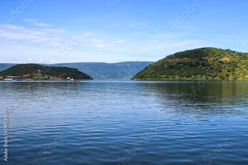 Beautiful clear blue water of Lake Tanganyika and wooded hills
