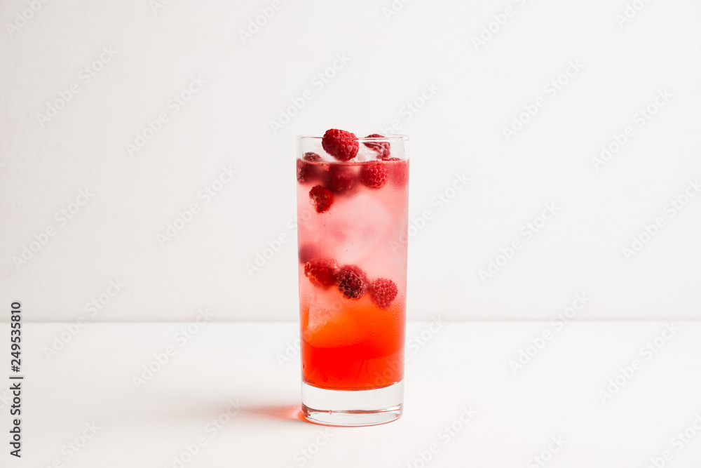 Sweet raspberry Tom collins cocktail. Selective focus. Shallow depth of field. Sweet raspberry Tom collins cocktail. Selective focus. Shallow depth of field.