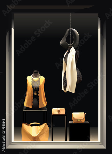 Boutique window with mannequins in black and yellow colors.
