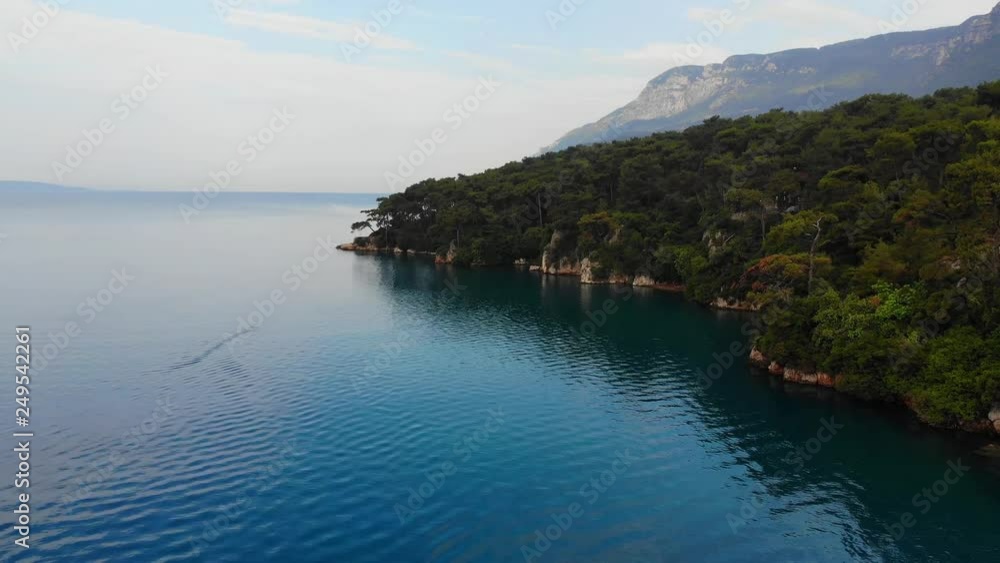 An idyllic aerial view of Gulf of Gokova coastline (the Aegean Sea) under the summer skies… An idyllic aerial view of Gulf of Gokova coastline (the Aegean Sea) under the summer skies…