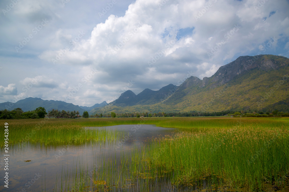 landscape of mountains and big green lake, Sam Roi Yot, Thailand.