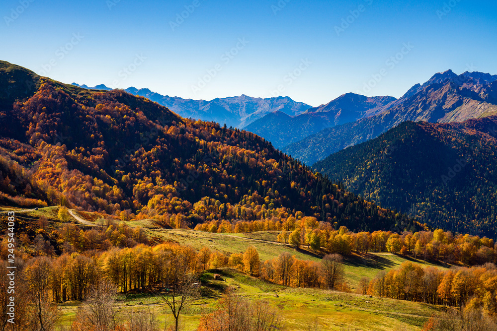 Mountains in autumn on a Sunny cloudless day. Great Caucasus range. Abkhazia. Georgia.