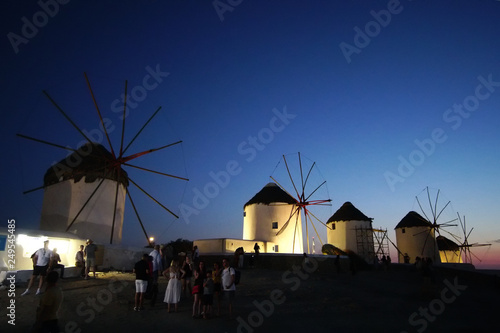 Characteristic and famous windmills at night in the small town of Chora