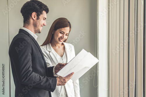 Photography Businessman executive is in meeting discussion with businesswoman or client in modern workplace office