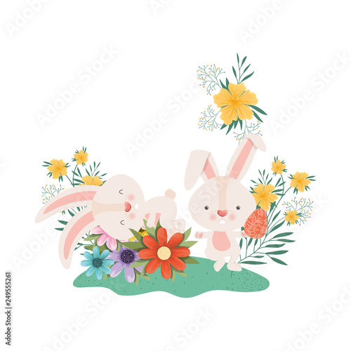 easter bunnies with flowers isolated icon