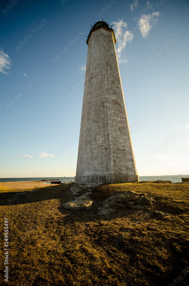 Fototapeta premium New Haven Lighthouse at Lighthouse Point, in Connecticut at golden hour