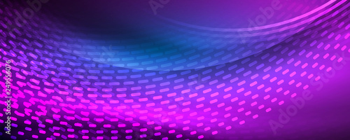 Glowing light particles in dark neon space, magic glow shiny abstract background