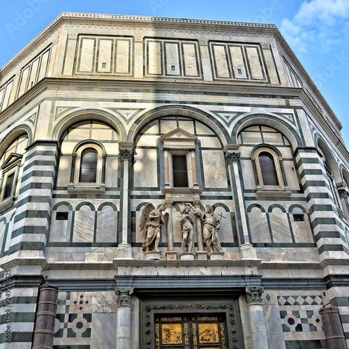 The Baptistery is one of the oldest buildings in Florence Italy. 4th century. Iconic octagonal basilica with striking marble facade, known for its bronze doors and mosaic ceiling. Italy, Florence