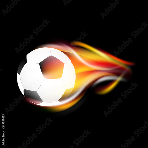 Soccer ball and fire on a black background.