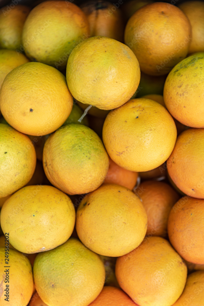 Closed shot of fresh oranges stacked ready to eat Closed shot of fresh oranges stacked ready to eat