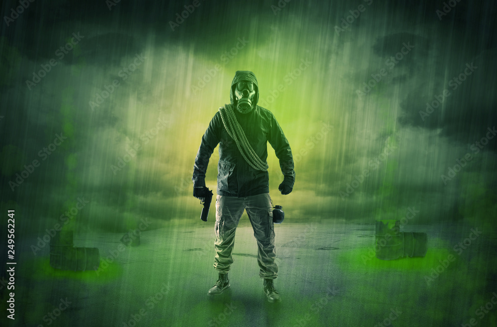 Masked unrecognizable guard in an abandoned space after explosion
Masked unrecognizable guard in an abandoned space after explosion
