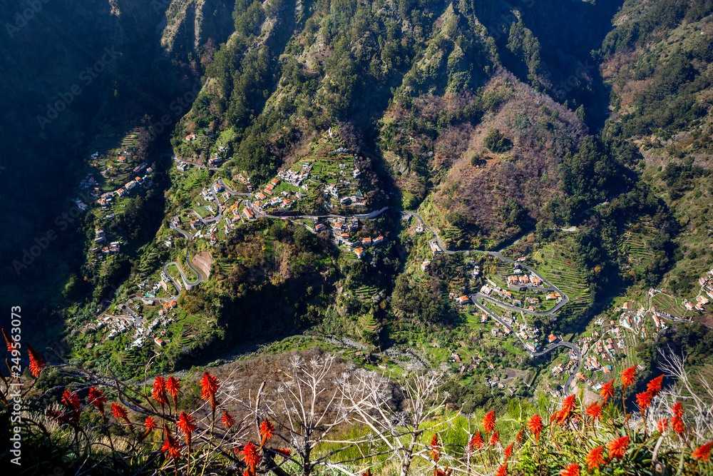 Panorama of isolated high cliff valley of Curral das Freiras. Madeira, Portugal.
