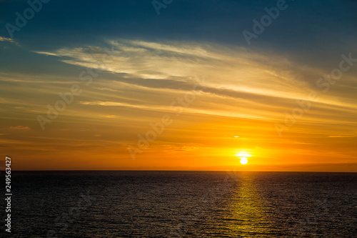Sunset over the ocean © Sergey Kelin