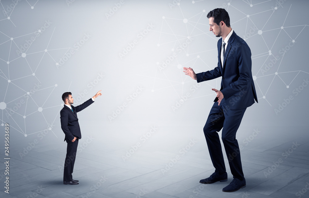 Small businessman aiming at a big businessman with connection and network concept
Small businessman aiming at a big businessman with connection and network concept