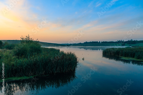 sunset over lake © Evgeny